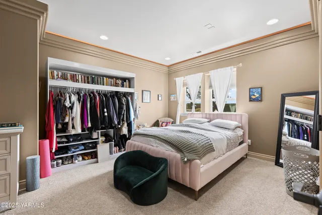 a bathroom with a granite countertop sink a toilet and a mirror