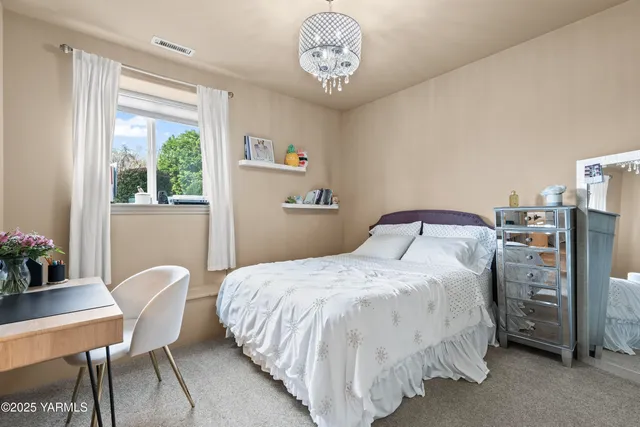 a dinning table and chairs in the patio of a house