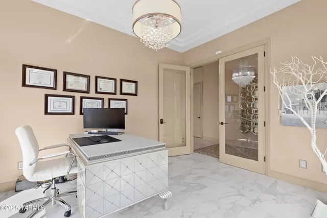 a workspace with furniture and window