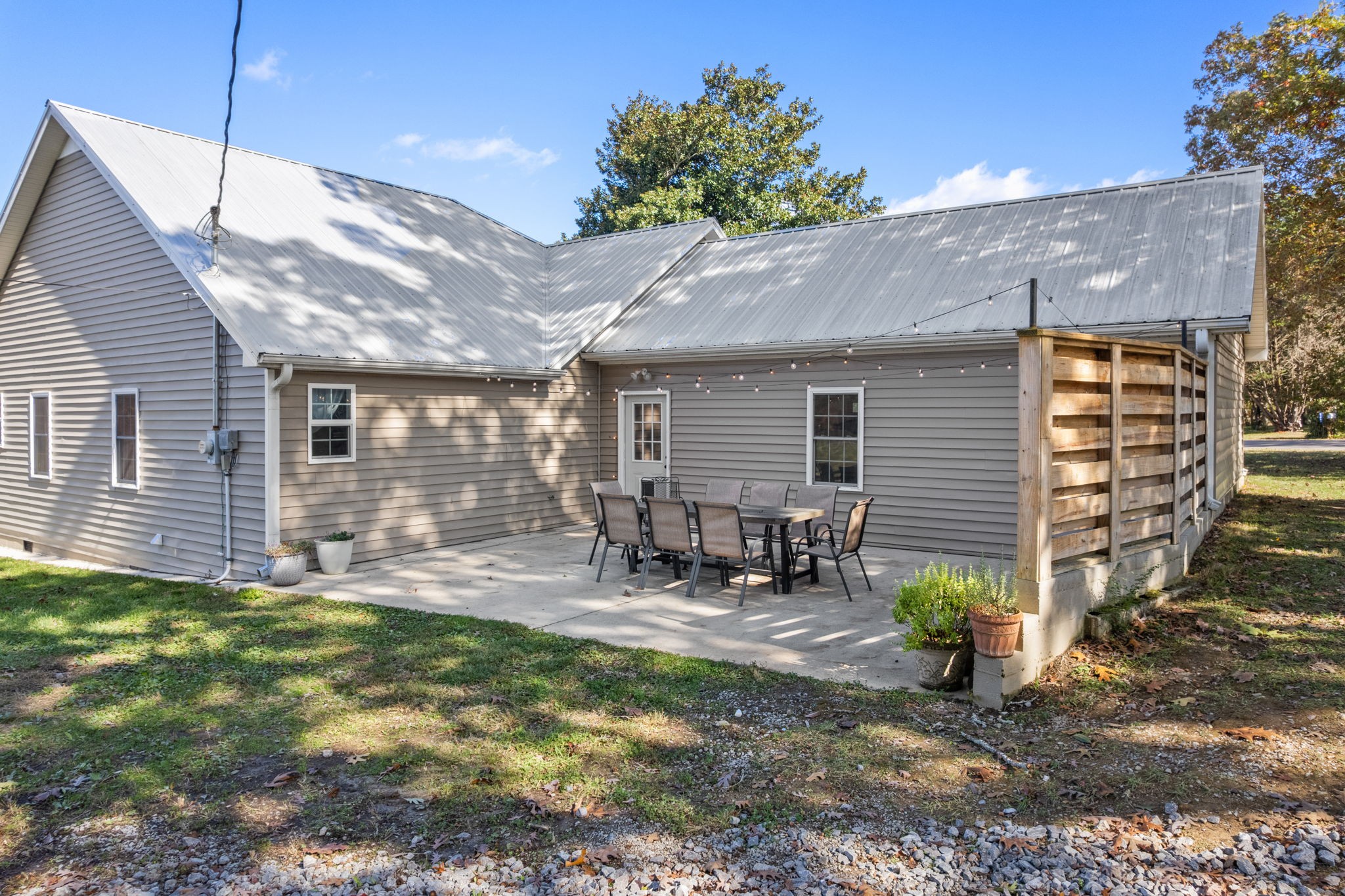 1517 Motlow College Road Normandy, TN 37360 - Photo 4 of 78 a backyard of a house with table and chairs