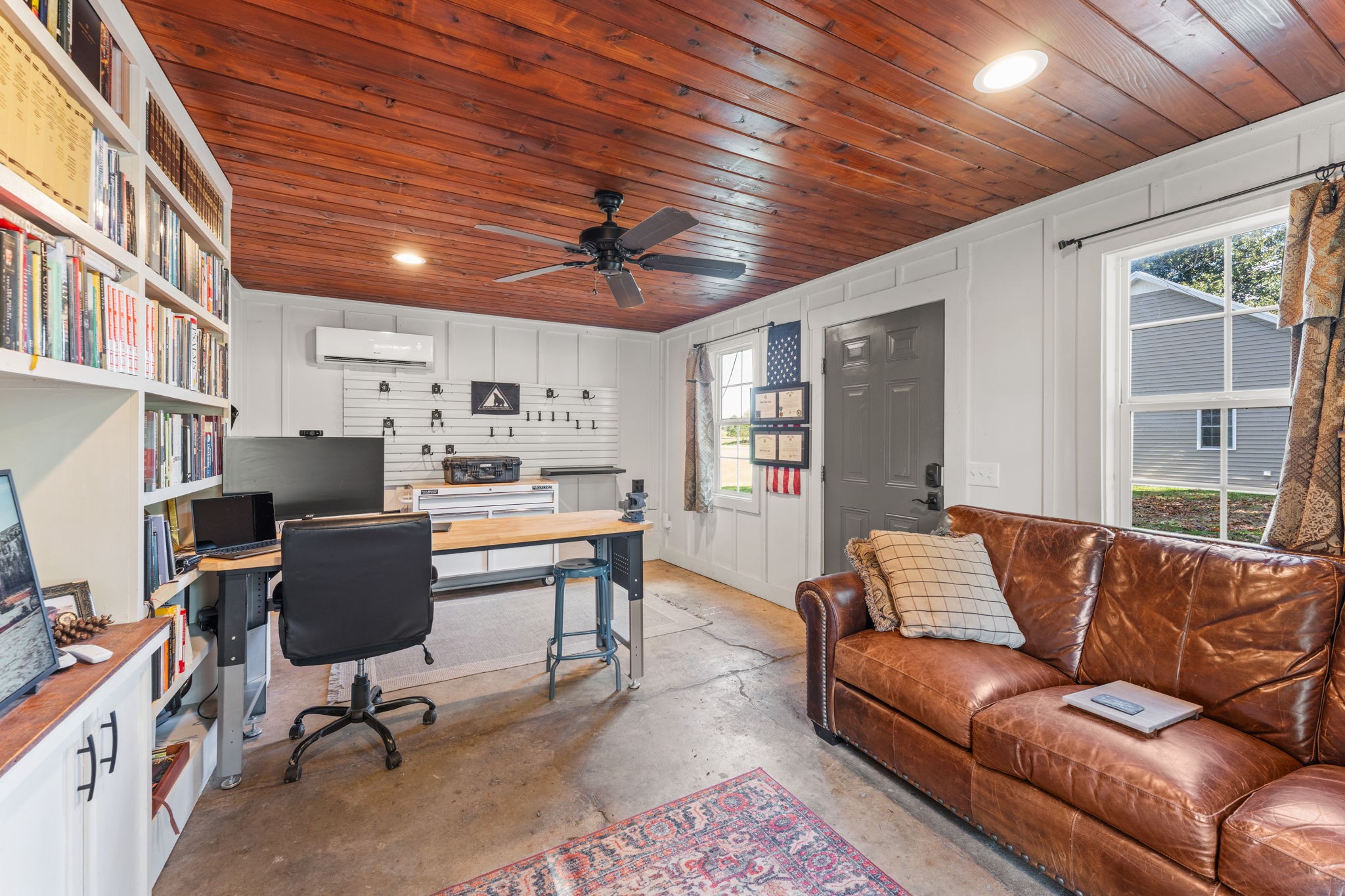 1517 Motlow College Road Normandy, TN 37360 - Photo 56 of 78 a living room with furniture and a flat screen tv