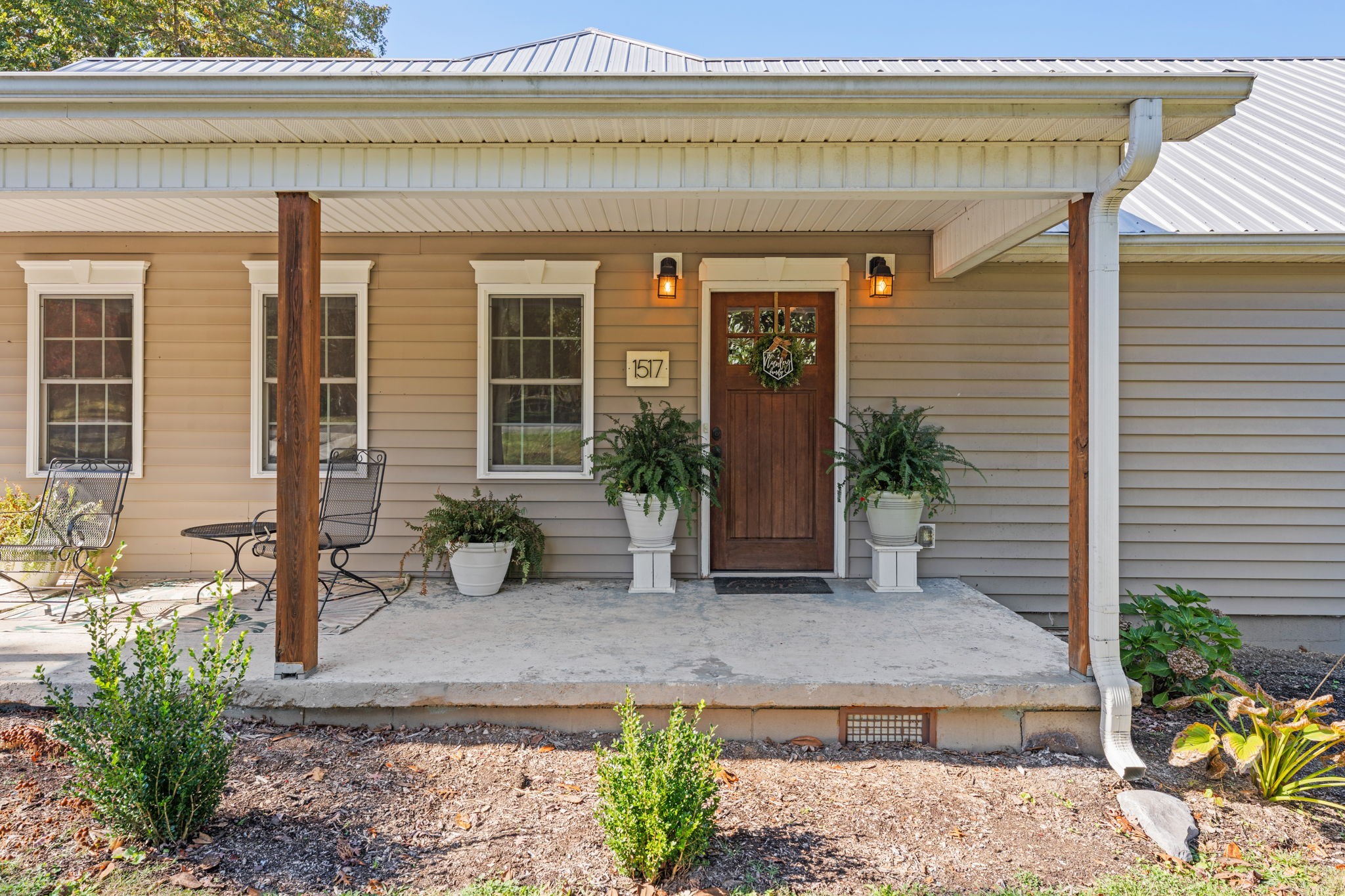 1517 Motlow College Road Normandy, TN 37360 - Photo 10 of 78 a front view of a house with garden