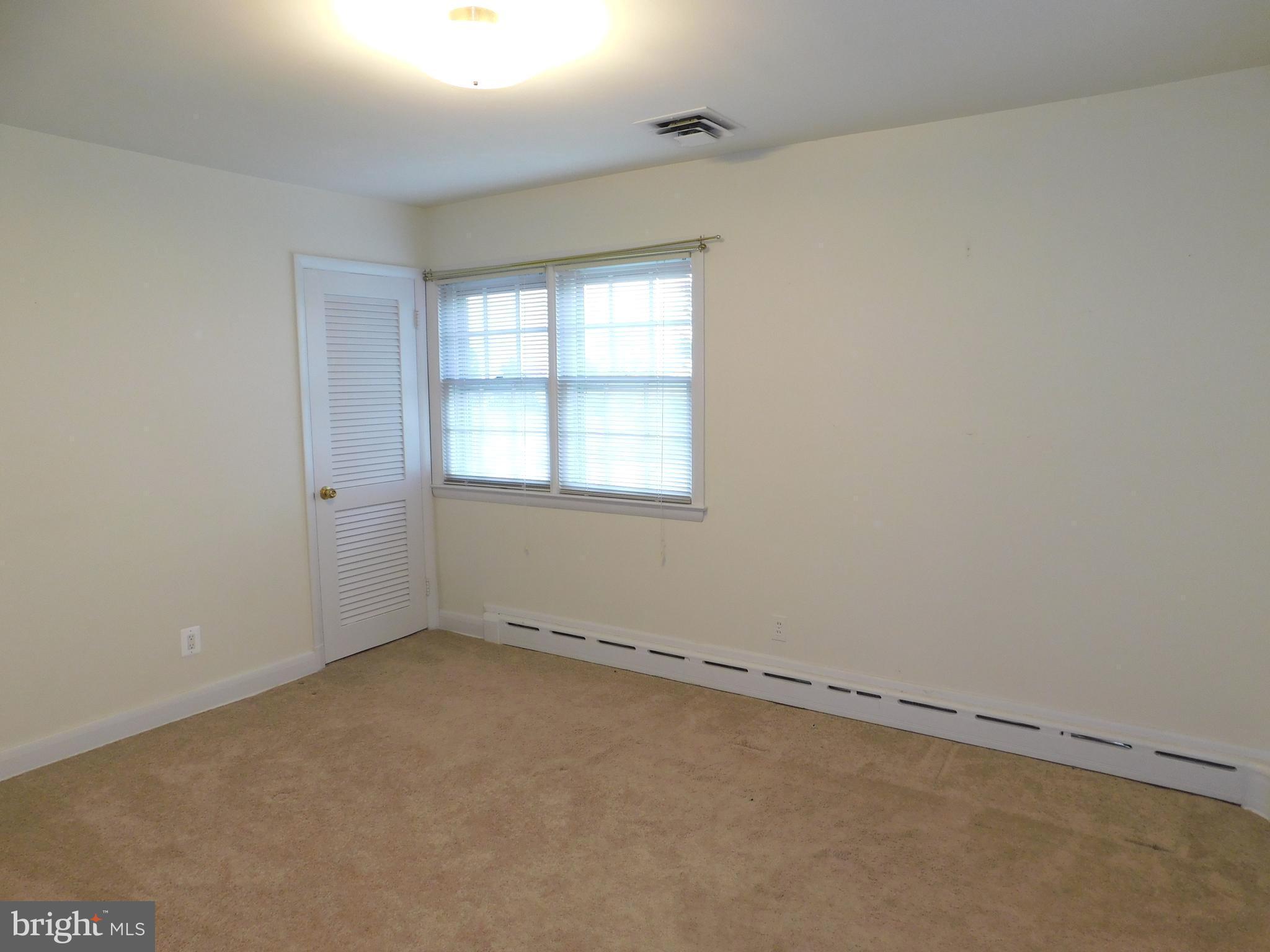 3855 Wayson Road Davidsonville, MD 21035 - Photo 16 of 27 Main Level Fourth Bedroom w/ HW's Under Carpet