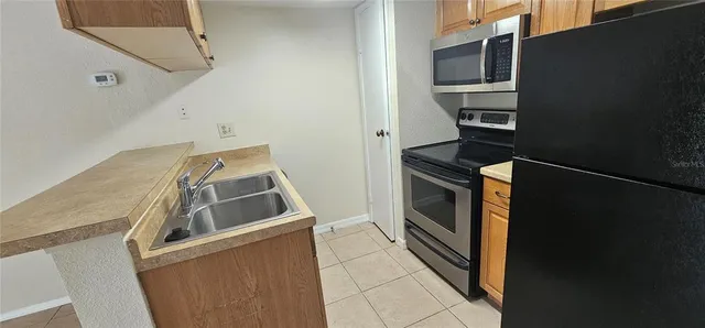 an empty room with a bathroom