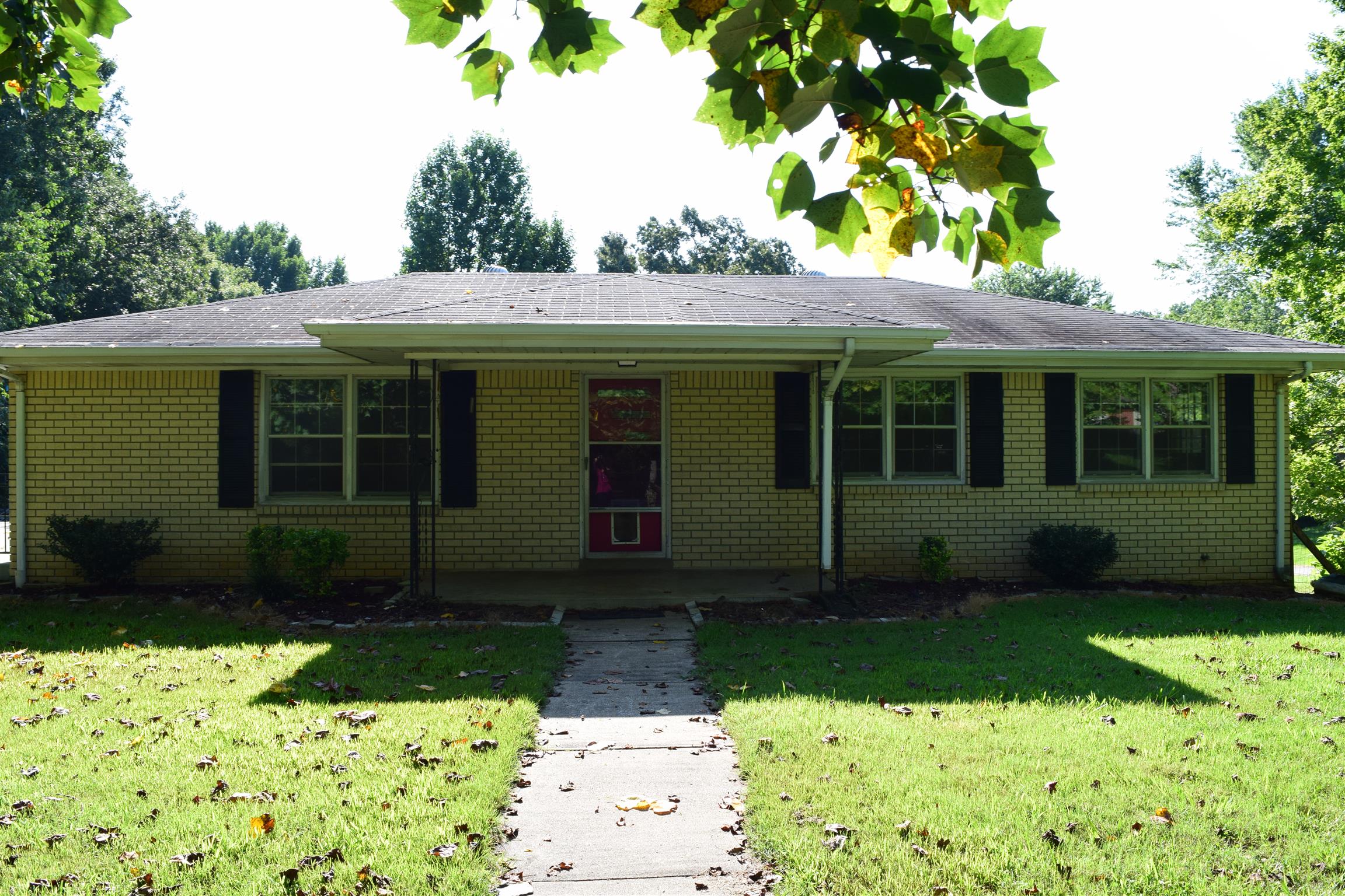 100 Towering Oaks Road Tennessee Ridge, TN 37178 - Photo 1 of 16 a view of a house with a yard
