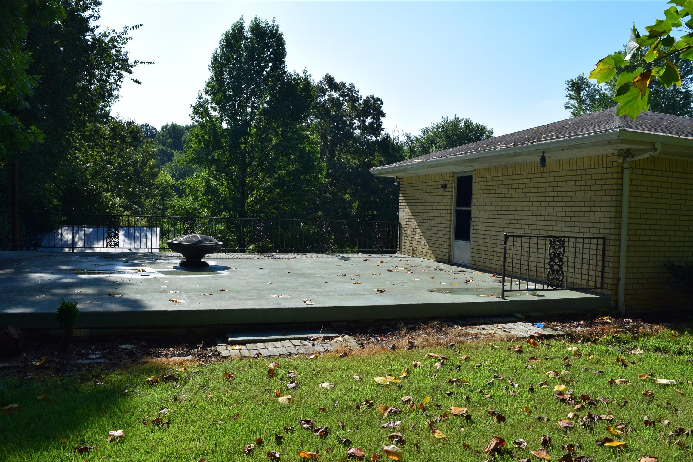 100 Towering Oaks Road Tennessee Ridge, TN 37178 - Photo 2 of 16 a view of swimming pool with a yard and plants
