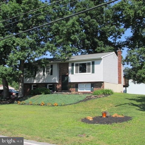 385 West Ridge Road Elizabethtown, PA 17022 - Photo 1 of 33 a house view with a sitting space and garden