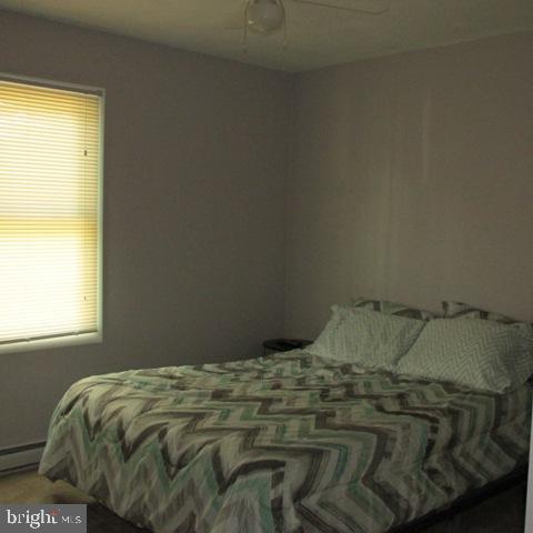 385 West Ridge Road Elizabethtown, PA 17022 - Photo 16 of 33 a bed sitting in a bedroom next to a window