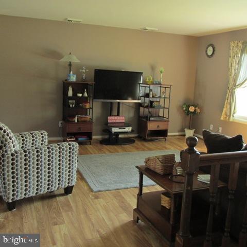 385 West Ridge Road Elizabethtown, PA 17022 - Photo 6 of 33 a living room with furniture and a flat screen tv