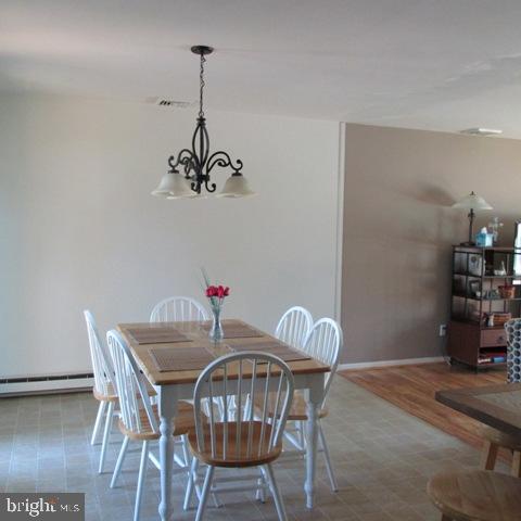385 West Ridge Road Elizabethtown, PA 17022 - Photo 8 of 33 a view of a dining room with furniture and wooden floor