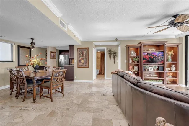a view of a dining room with furniture