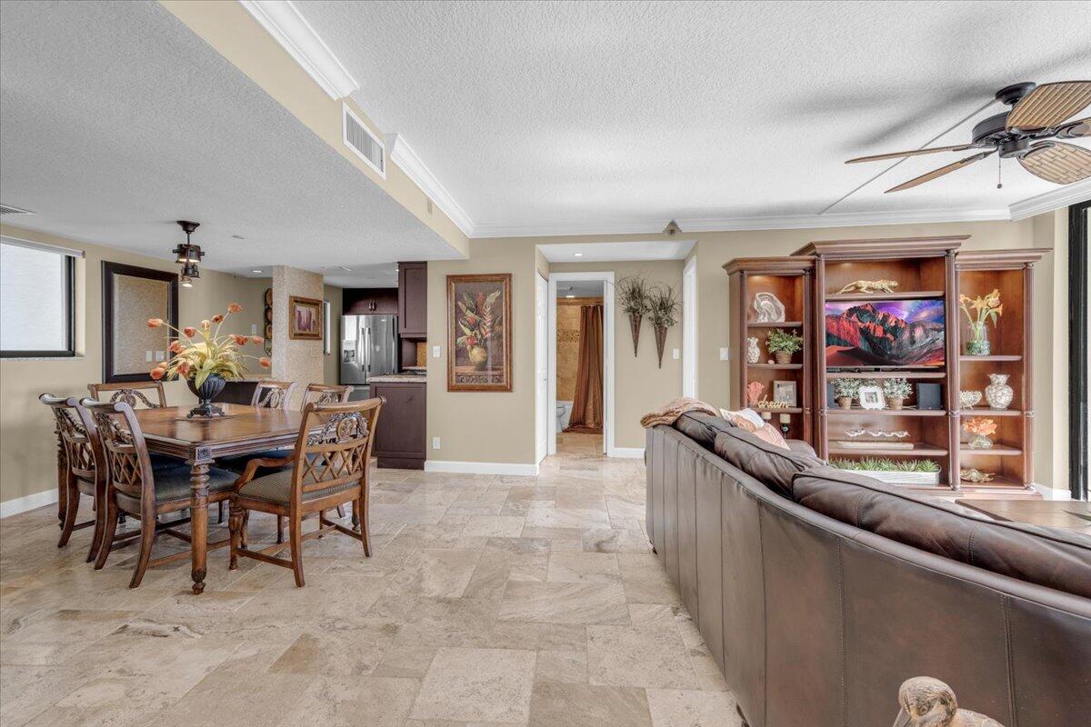200 Ocean Trail Way, Unit 108 Jupiter, FL 33477 - Photo 12 of 38 a view of a dining room with furniture