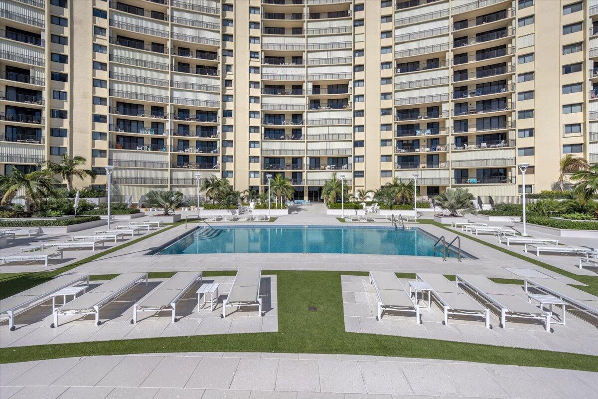 200 Ocean Trail Way, Unit 108 Jupiter, FL 33477 - Photo 27 of 38 a picture of a building and a street