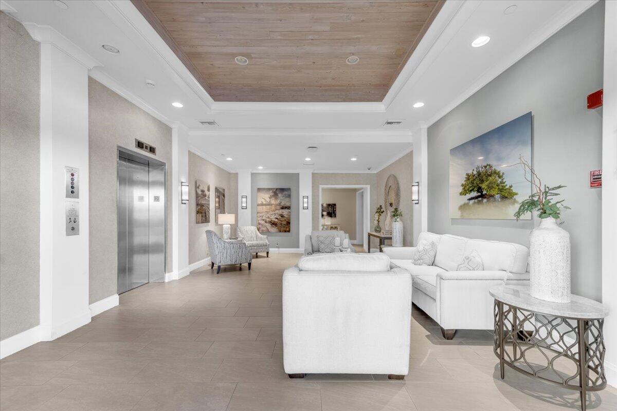 200 Ocean Trail Way, Unit 108 Jupiter, FL 33477 - Photo 30 of 38 a large white room with a couch