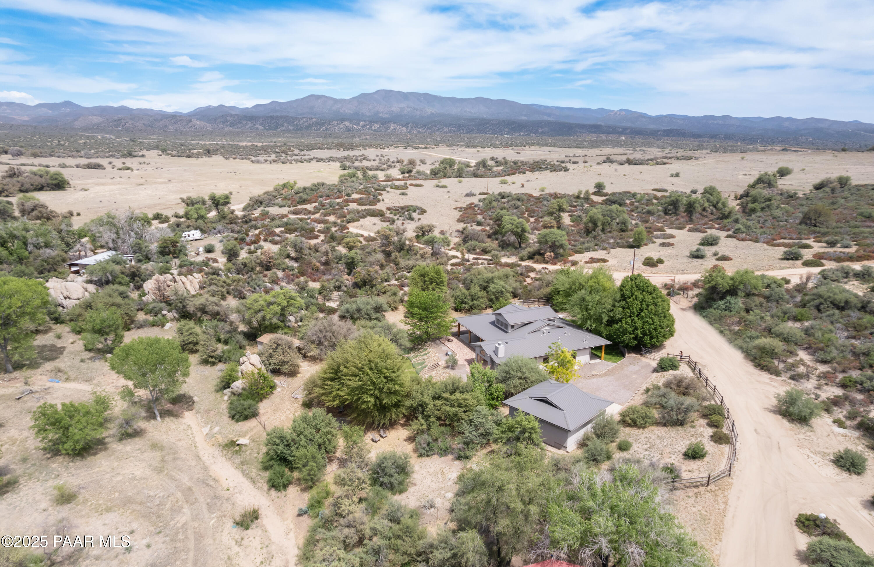 770 Grisby Road Skull Valley, AZ 86338 - Photo 56 of 58 a view of a city with mountains in the background