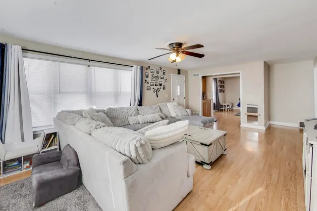 a workspace with furniture and window