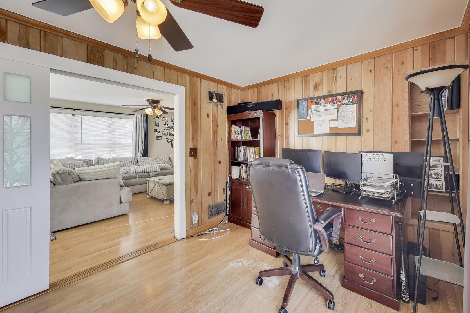 29 Iowa Avenue Addison, IL 60101 - Photo 4 of 31 a workspace with furniture and window