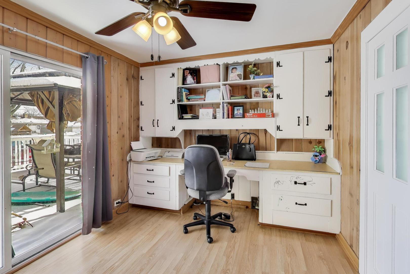 29 Iowa Avenue Addison, IL 60101 - Photo 5 of 31 a view of a workspace with furniture and a window