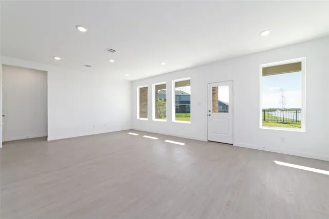 an empty room with windows