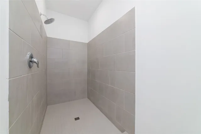 a view of a house with backyard and porch