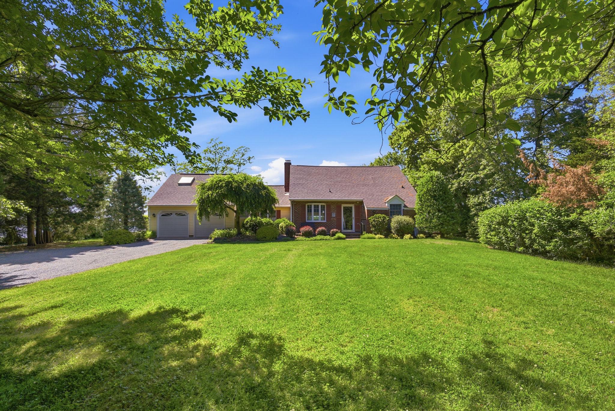 202 Royston Shores Road Chestertown, MD 21620 - Photo 3 of 72 Charming home nestled in lush greenery.