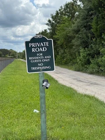 a street sign sitting on the side of a road