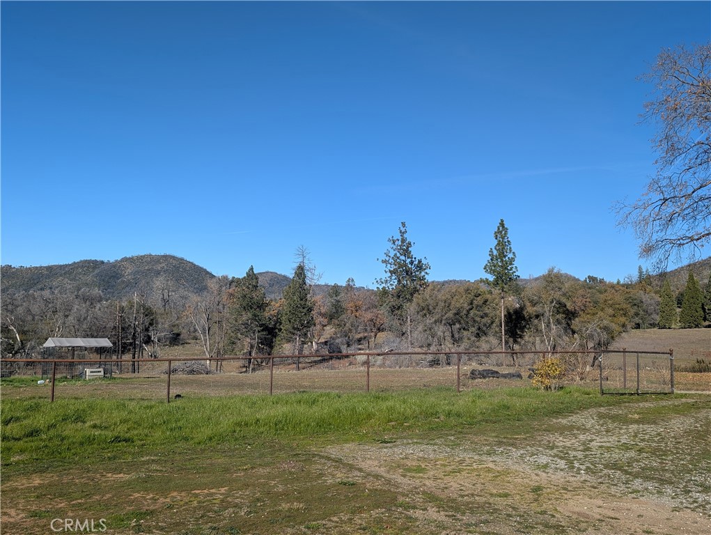 4103 Triangle Road Mariposa, CA 95338 - Photo 20 of 39 a view of a grassy field with trees