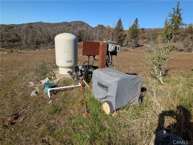 a aerial view of a house with mountain view