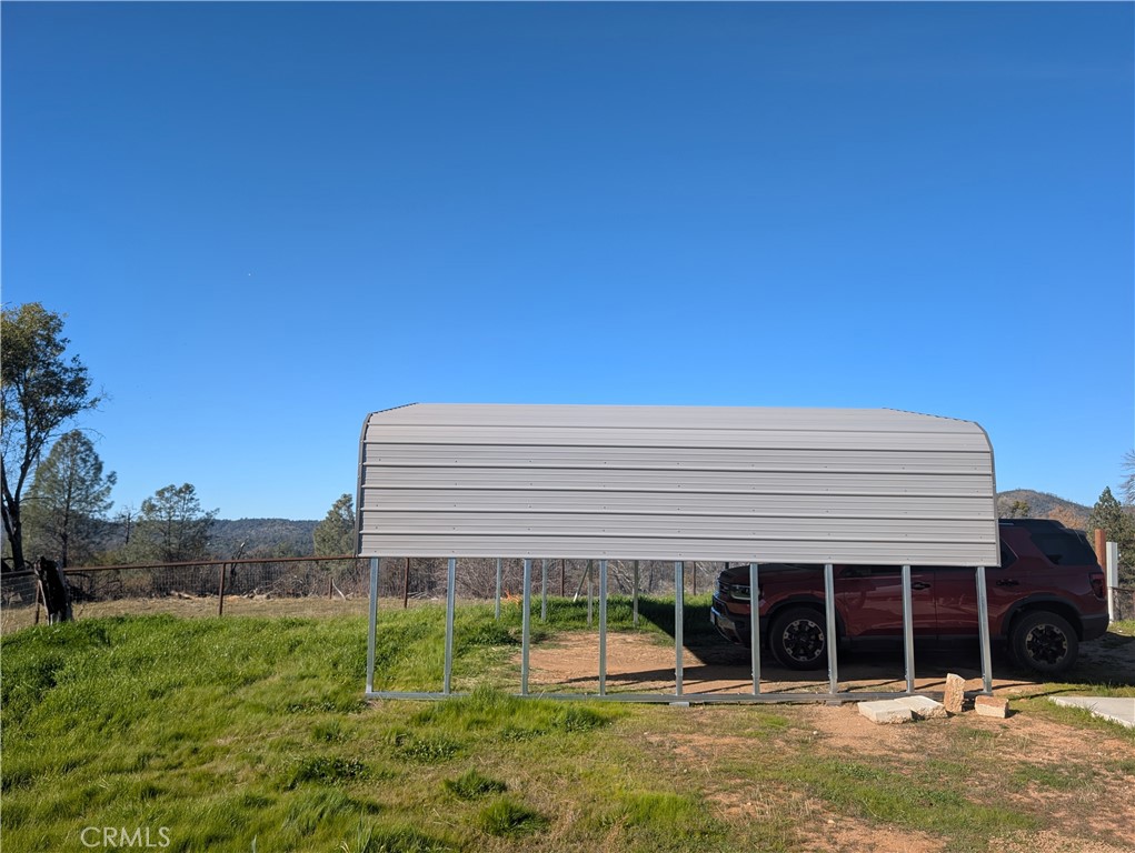 4103 Triangle Road Mariposa, CA 95338 - Photo 29 of 39 a front view of a house with a yard