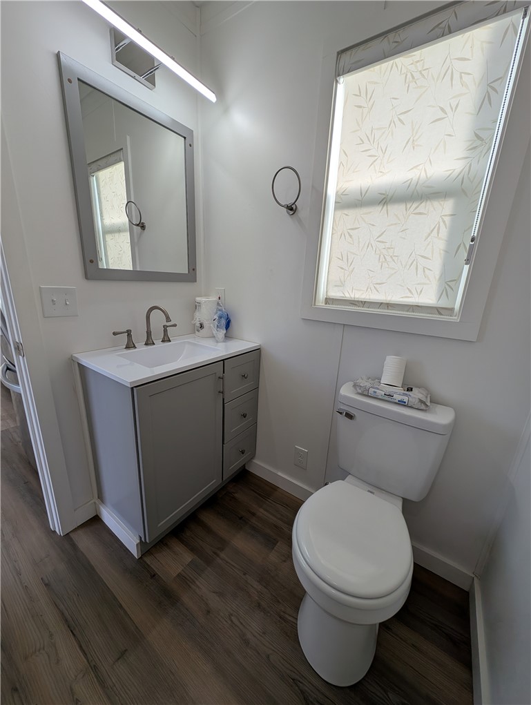 4103 Triangle Road Mariposa, CA 95338 - Photo 35 of 39 a bathroom with a toilet a sink and mirror
