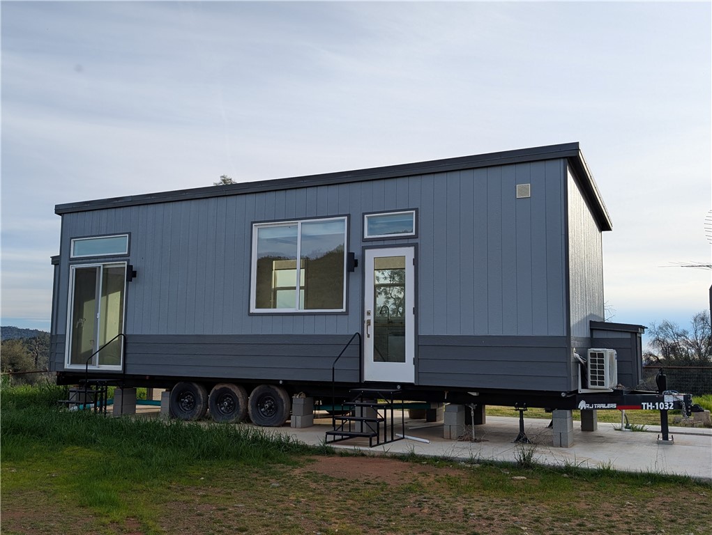 4103 Triangle Road Mariposa, CA 95338 - Photo 4 of 39 a front view of building with river and trees in the background