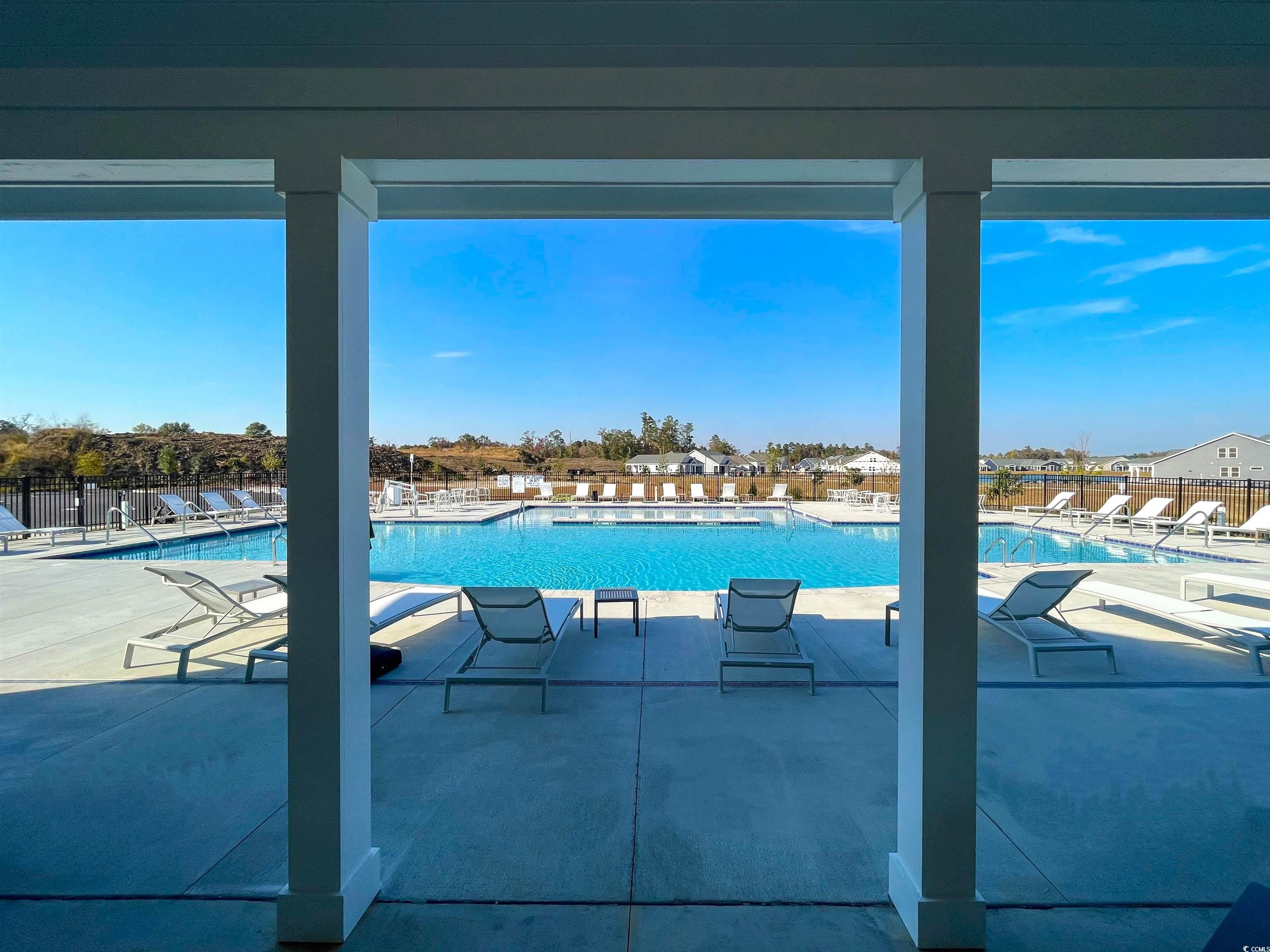 3051 Deerberry Place Longs, SC 29568 - Photo 25 of 28 View of swimming pool with a patio