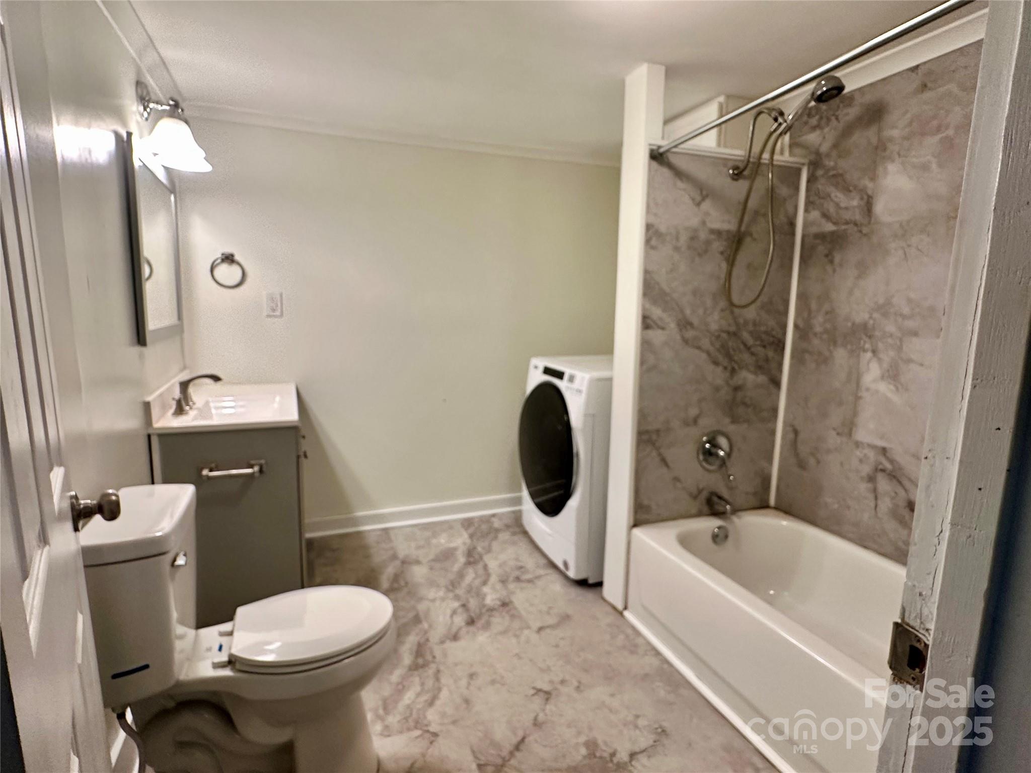 103 Fairview Street Clover, SC 29710 - Photo 16 of 24 a bathroom with a sink toilet and shower