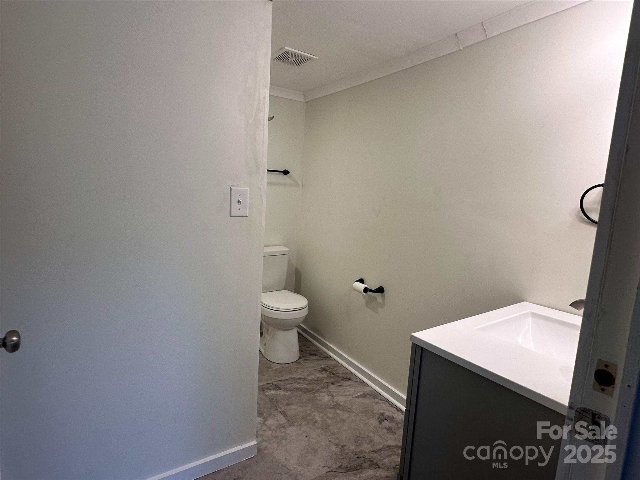 103 Fairview Street Clover, SC 29710 - Photo 19 of 24 a bathroom with a toilet