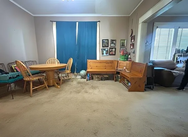 a room with furniture and a window