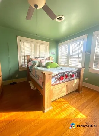 a bed room with a bed and a window