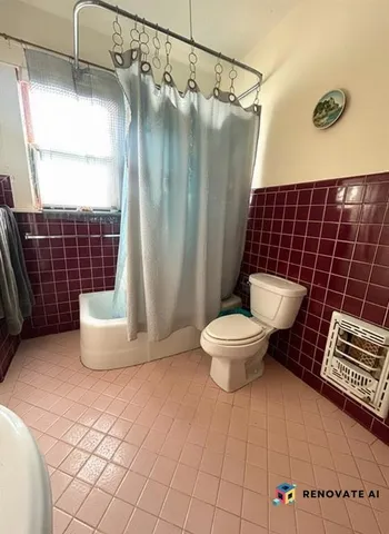 a bathroom with a toilet and a shower