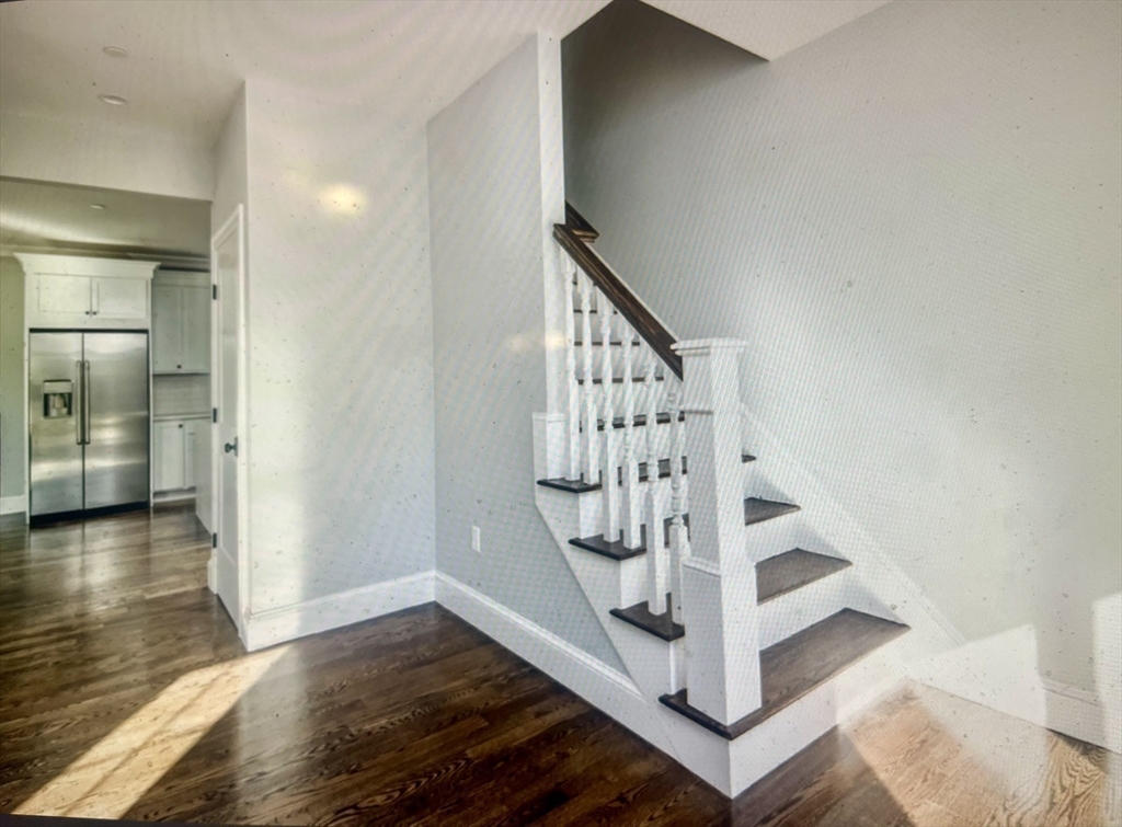 45 Widow Rites Lane Sudbury, MA 01776 - Photo 18 of 25 a view of entryway and hall with wooden floor