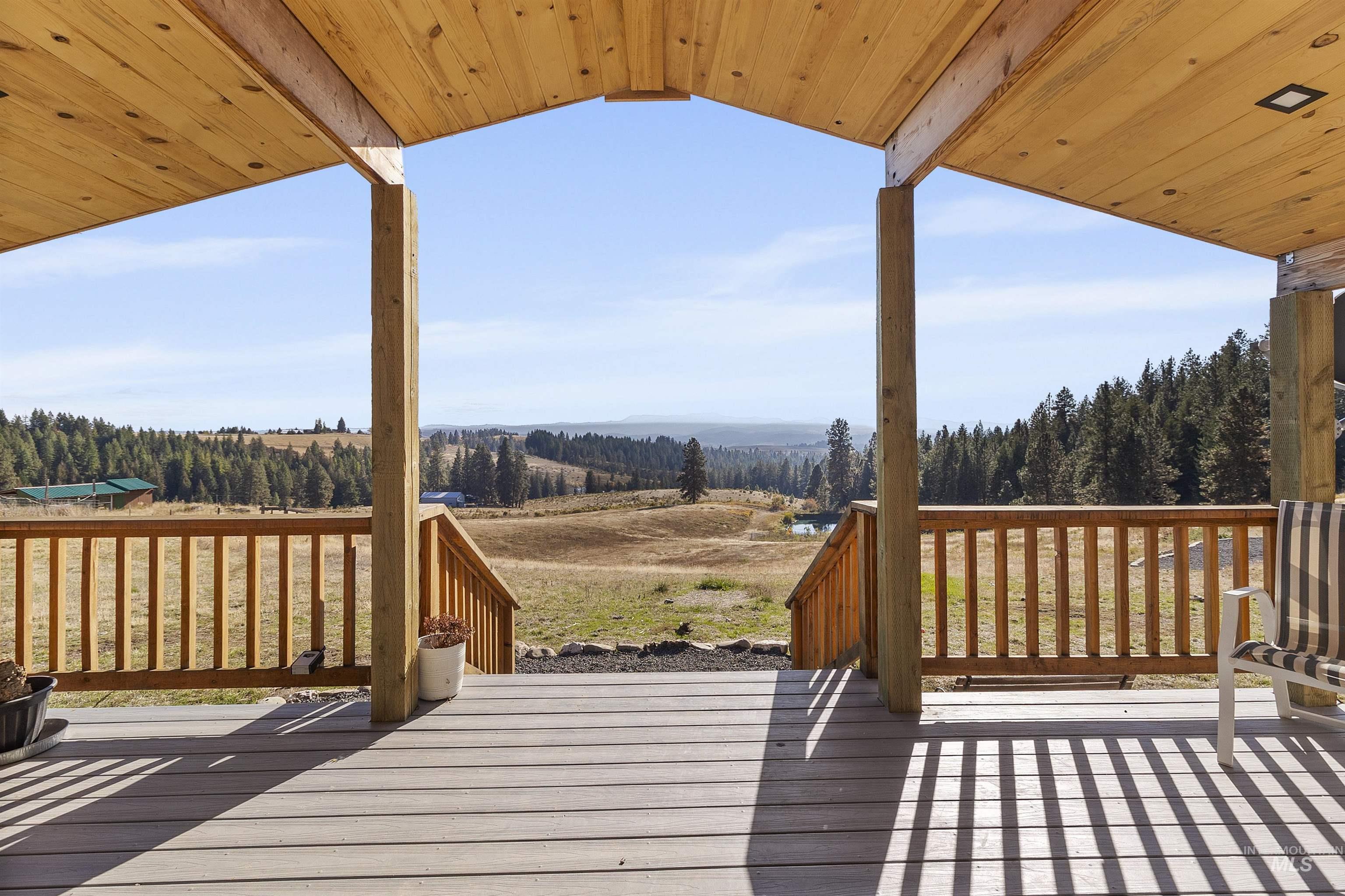 1311 Gold Hill Road Princeton, ID 83857 - Photo 2 of 25 Wooden deck with a rural view