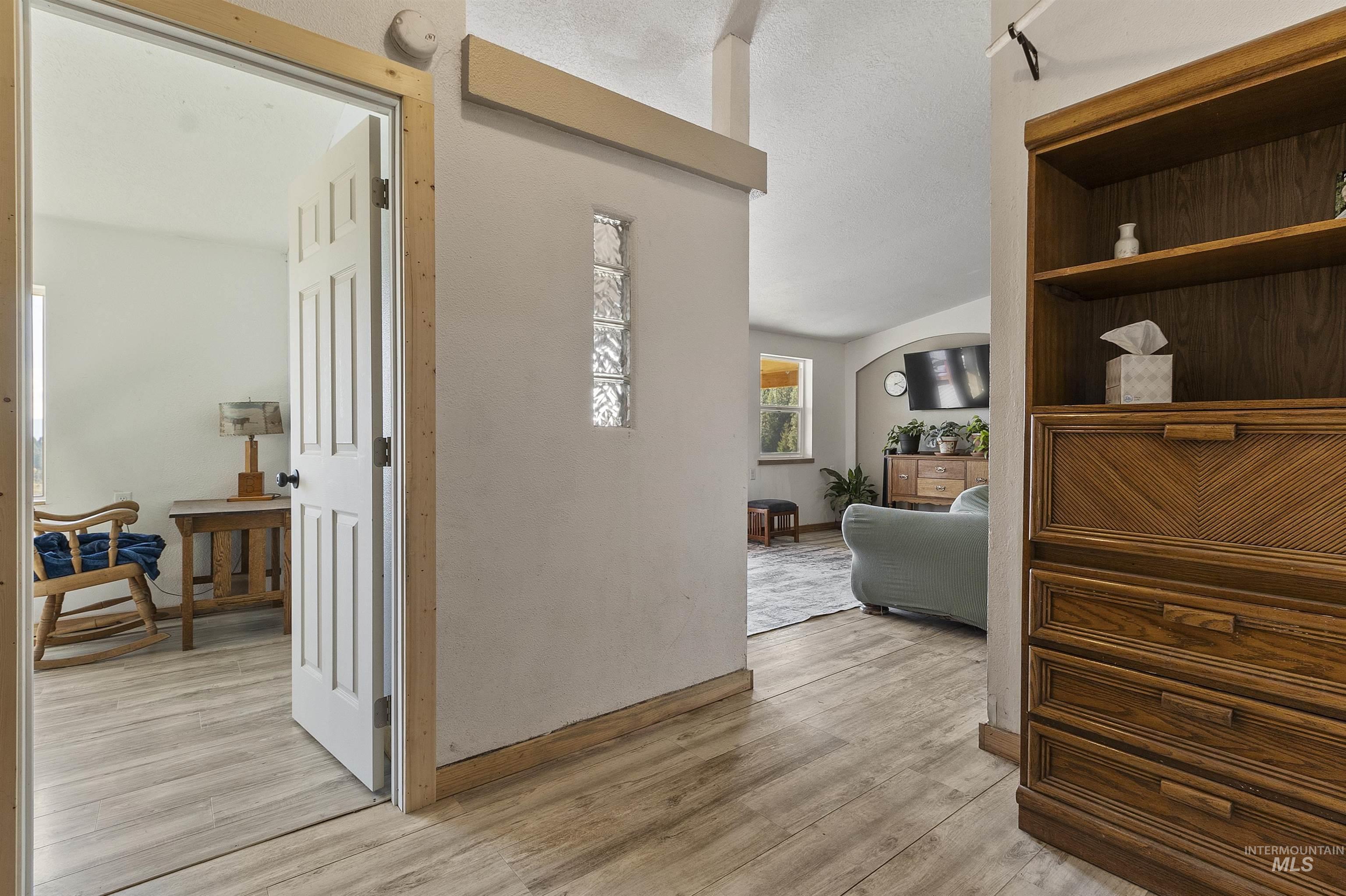 1311 Gold Hill Road Princeton, ID 83857 - Photo 8 of 25 Corridor featuring light wood-type flooring