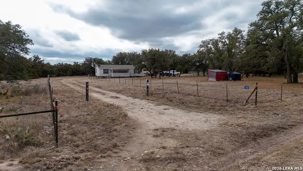 a view of a yard with entertaining space
