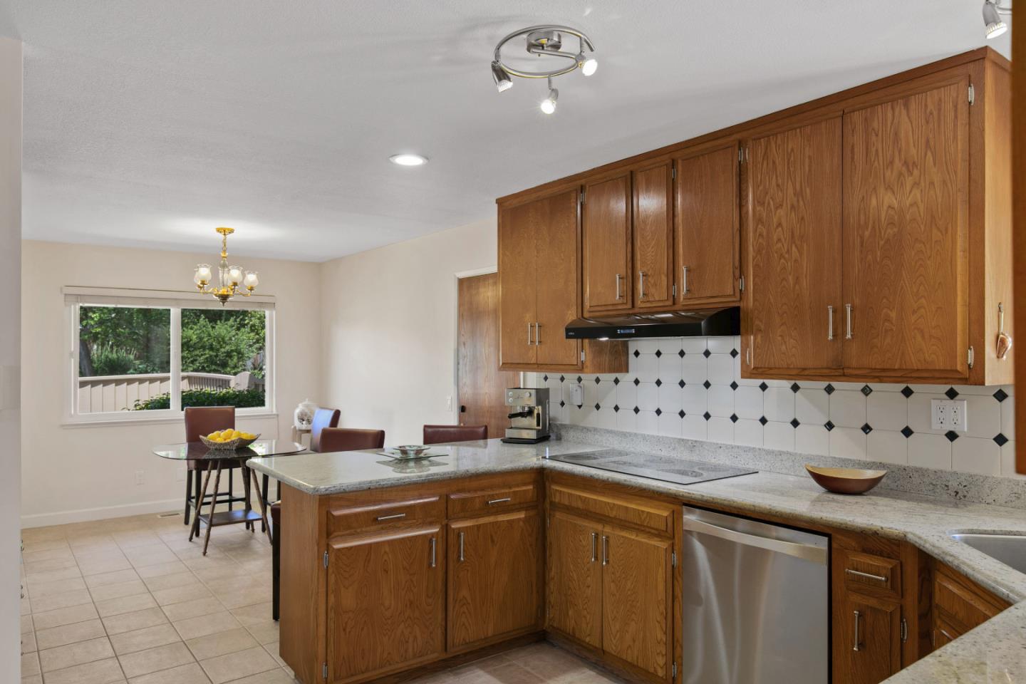 36 Robak Drive Watsonville, CA 95076 - Photo 16 of 39 a kitchen with sink cabinets and window