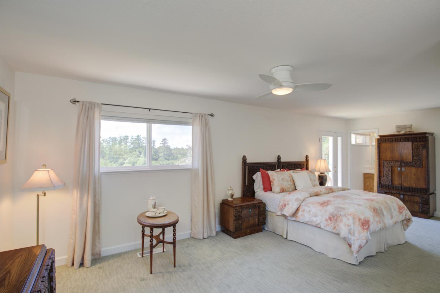 36 Robak Drive Watsonville, CA 95076 - Photo 19 of 39 a bedroom with a bed and a large window