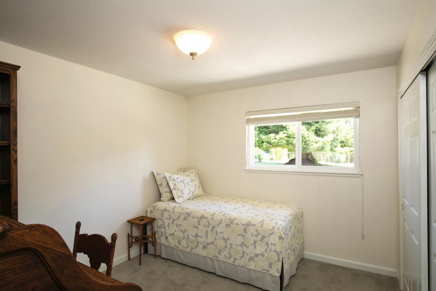 36 Robak Drive Watsonville, CA 95076 - Photo 21 of 39 a bedroom with a bed and a window