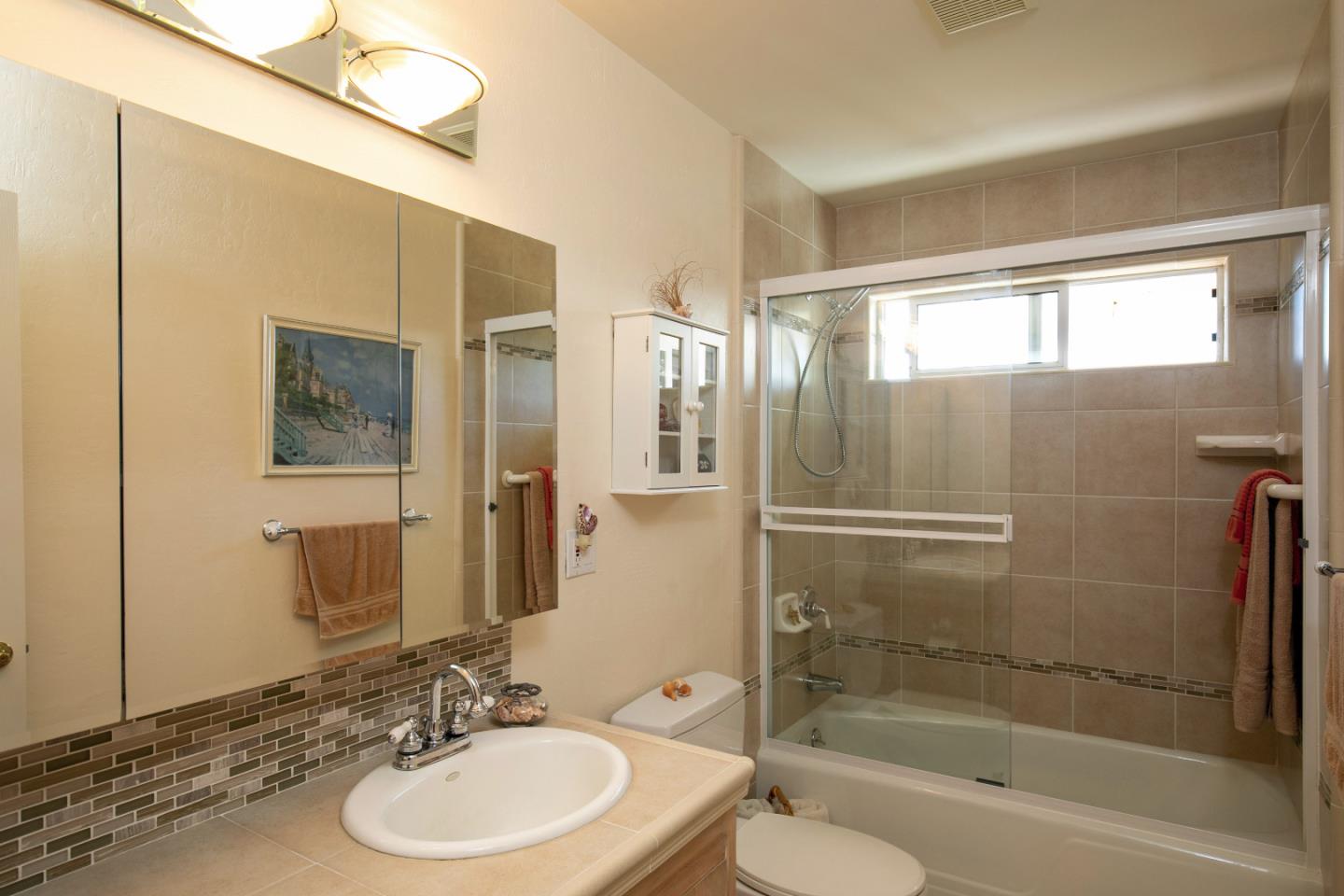 36 Robak Drive Watsonville, CA 95076 - Photo 23 of 39 a bathroom with a sink toilet and shower