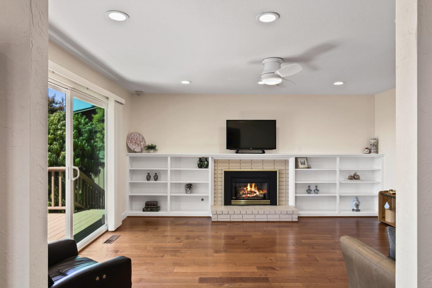 36 Robak Drive Watsonville, CA 95076 - Photo 9 of 39 a living room with furniture and a fireplace