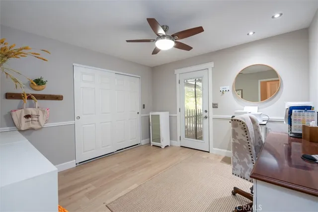 a bedroom with a bed and a table