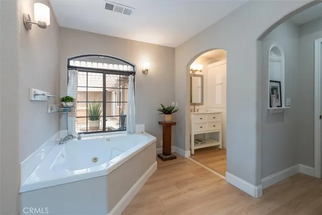 a backyard of a house with outdoor seating