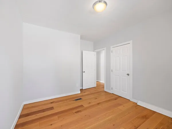 a view of a balcony and front door