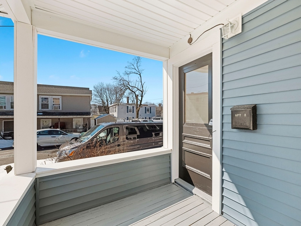 37 Howard Street Lynn, MA 01902 - Photo 20 of 42 a view of a balcony and front door